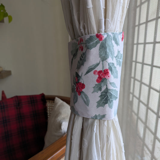 Curtain with floral tieback in a home setting